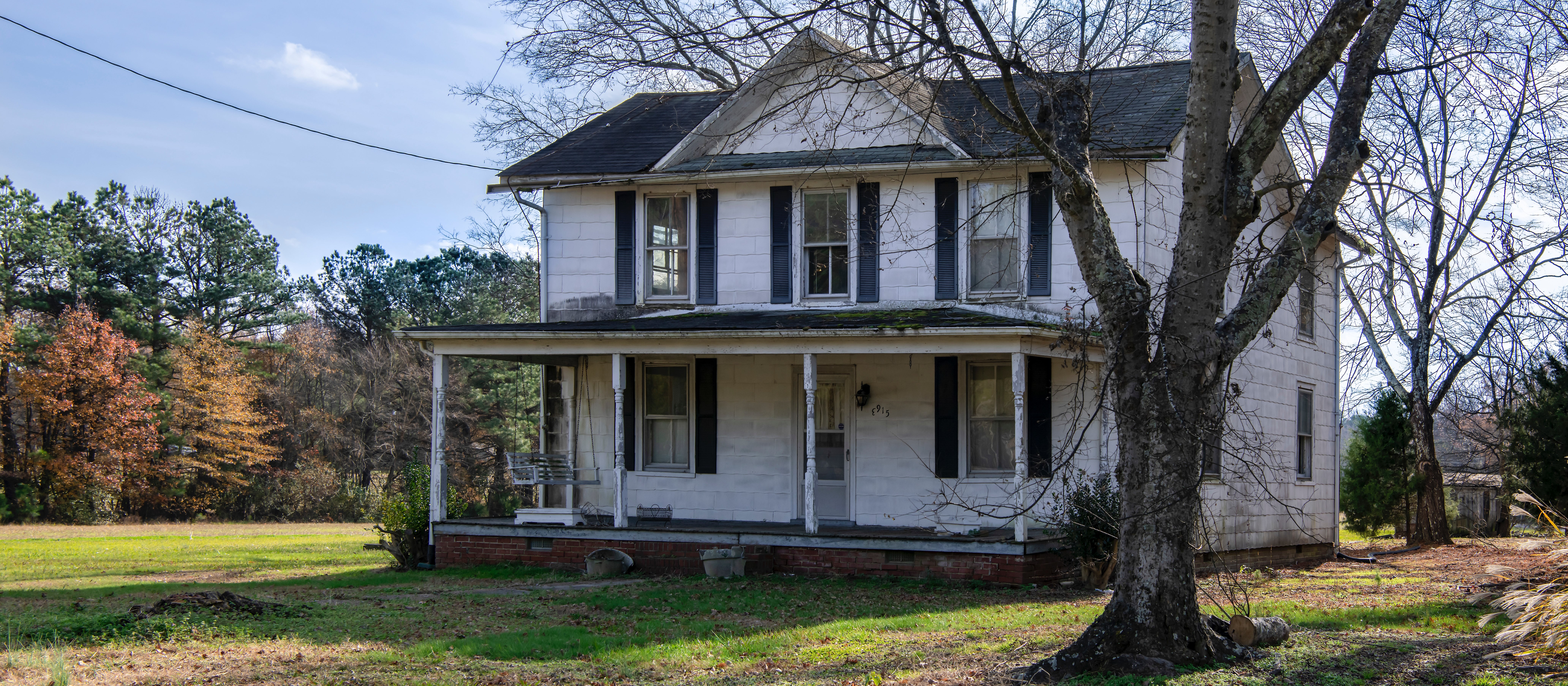 Old house with porch from robin-jonathan-deutsch unsplash.com